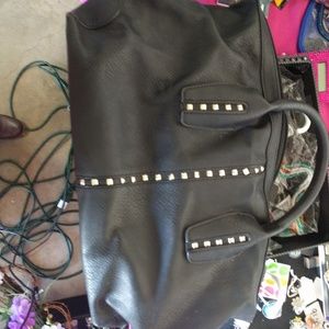 Leather studded black purse.